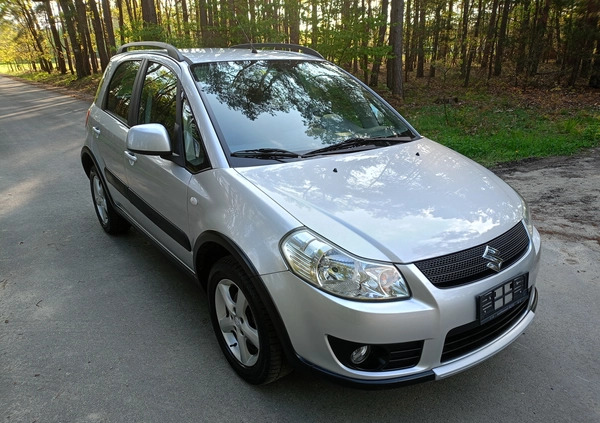 Suzuki SX4 cena 26990 przebieg: 170000, rok produkcji 2009 z Stepnica małe 379